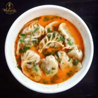 CHICKEN JHOL MOMOS